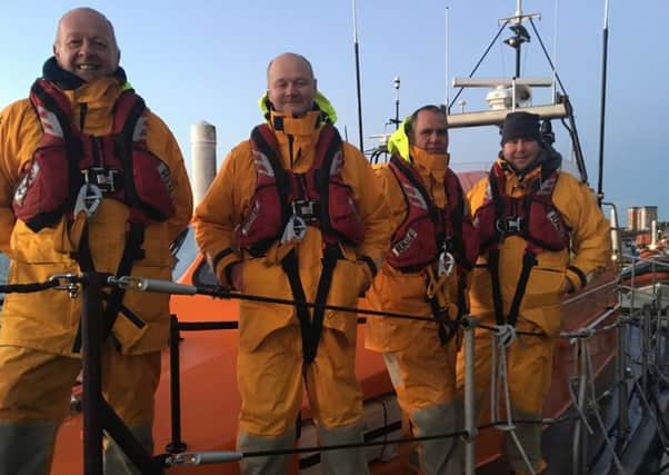 RNLI crewmen (from left): Gary Bird, Nick Glassbrook, John Atkinson, Tom Stuart
