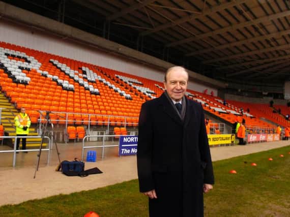 Armfield pictured in front of the stand named in his honour