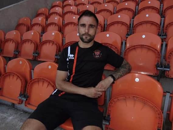 Hartley pictured at Bloomfield Road after making the move from Bristol Rovers