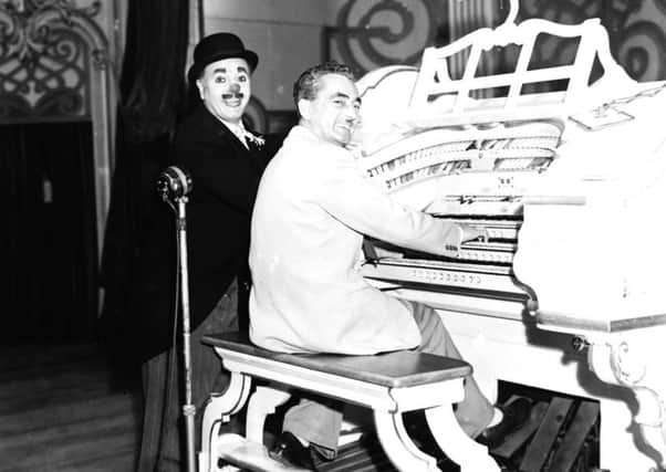 Charlie Cairoli and Reg Dixon at Tower organ in 1955