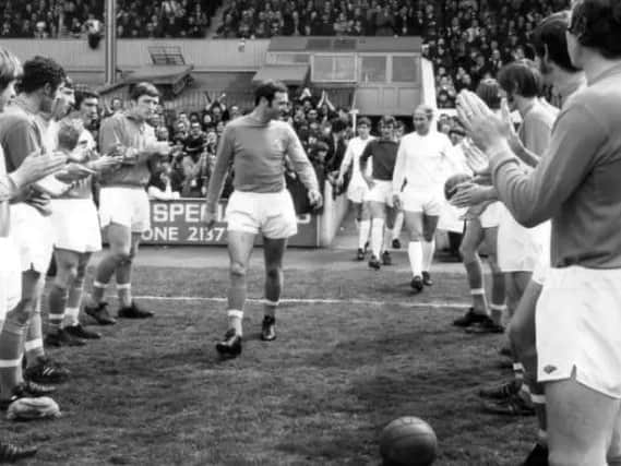 Jimmy Armfield is applauded on to the pitch by team-mates ahead of his 627th  and final  game as a Blackpool player