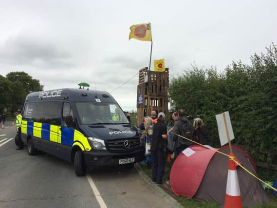 Police and protesters at the Preston New Road fracking site last July