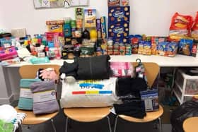 Staff at Specsavers in Cleveleys spent two weeks collecting food, clothing and toiletries which were donated to Streetlife and the Bridge Project to help the homeless
