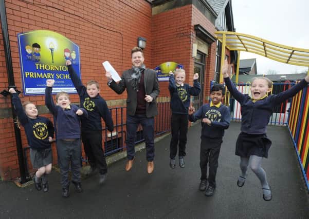 New headteacher at Thornton Primary School, David Ashcroft, is celebrating with pupils after getting a good Ofsted report.  He is pictured with Chloe Bamforth, Elan Philburn, Jonjo Edwards, Sophie DePledge, Abinash Pradeepan and Grace Brocklehurst.