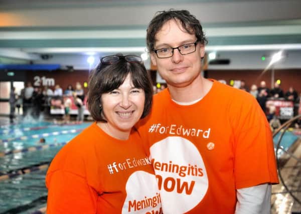 Edwards mum and dad Elizabeth and Justin at the Lions swimarathon