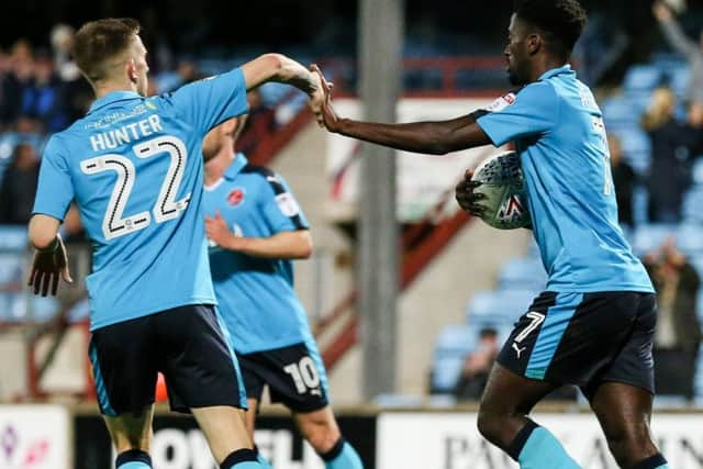 Jordy Hiwula celebrates scoring in the reverse fixture between Fleetwood Town and Scunthorpe United