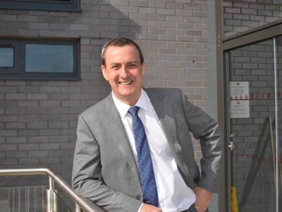 BES Utilities founder and managing director Andy Pilley, pictured at the firm's head office at Fleetwood Town's Highbury stadium, said legal action has been taken against Cheshire West and Chester Tranding Standards over a 2016 raid at the company's offices