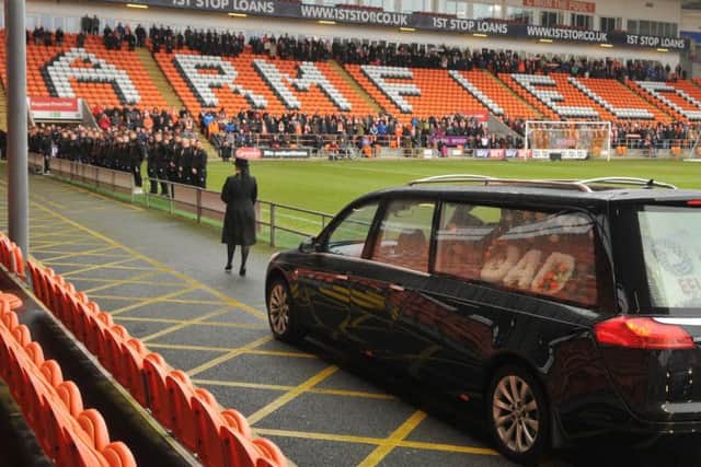 Minutes earlier, the cortege had driven through Bloomfield Road, where fans also gathered to pay their respects and listen to the service over the PA system.