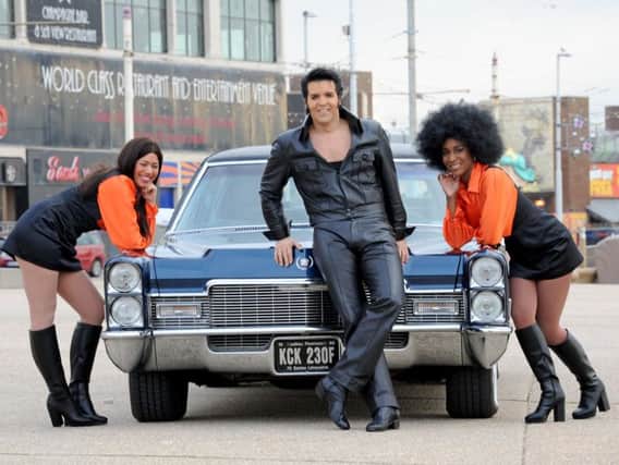 The cast of This Is Elvis on Blackpool Promenade. Pictured is Steve Michaels with Katrina May and Chevone Stewart.