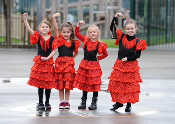 Pupils at Mereside Primary dress in Spanish colours and costumes to celebrate their twinning with a Spanish school.  Pictured are Tayla Hawes, Keya Hughes, Erin Lambert and Camilla Pye.
