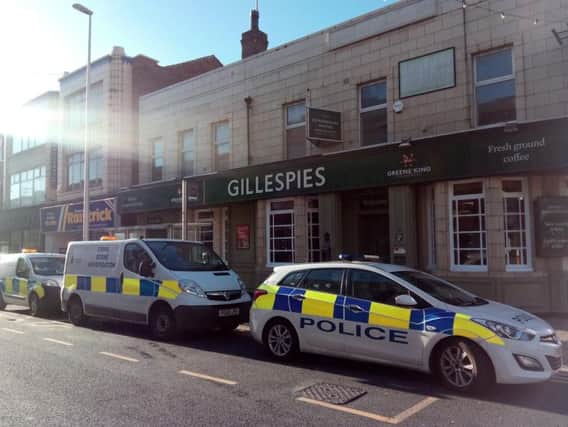 Police outside Gillespies at the time Lisa Chadderton was found