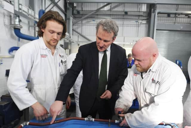 Education Secretary Damian Hinds is shown some of the working being done in the Marine Education Centre