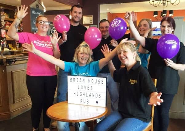 Sharon Gallagher (front right) and the Highlands team smashed their fundraising target, in aid of Brian House