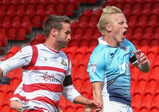 Mark Cullen picked up a hamstring injury against Doncaster Rovers in August