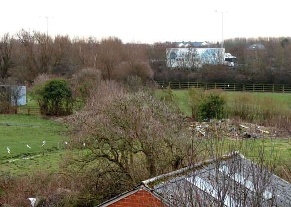 A view from one of the houses showing the land in question, looking towards Progress Way. Marton Moss