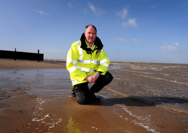 Fleetwood Coastguard station officer Mark Sumner is warning people of the dangers of sinking mud and treacherous tides on Fleetwood beach