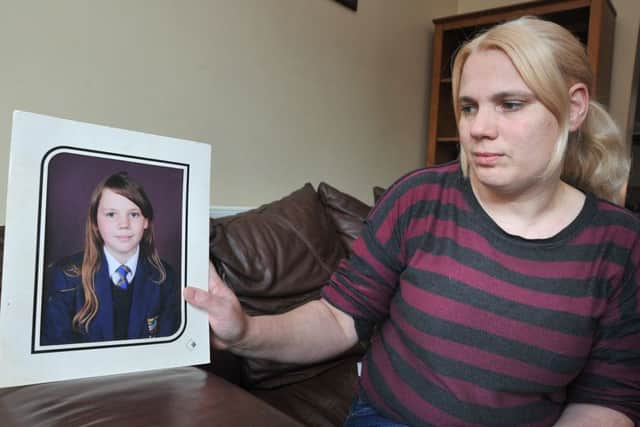 Tara Palin, with picture of her daughter who was sent away to Middlesbrough
