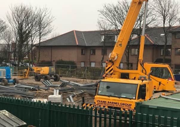A huge yellow crane moved onto the building site at Park Community Academy, where a new five-classroom block is being built. It will be used to hoist up steelwork for the building's frame. (Picture: Park Community Academy/Twitter: @ParkSchoolBPL)