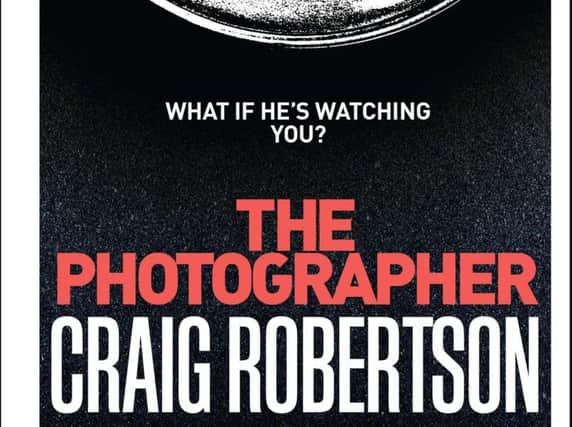 The Photographer by Craig Robertson