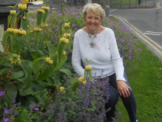 Norah Hoyles in one of her best-known guises, as a driving force behind the Garstang in Bloom organisation.