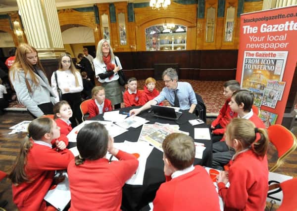 Blackpool Gazette reporter Tim Gavell talks to children from Our Lady of the Assumption Primary School