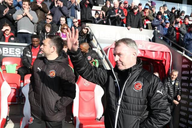 John Sheridan salutes the fans on his first game as Fleetwood boss