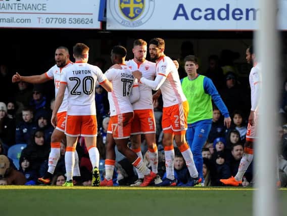 Blackpool celebrate Robertson's goal at Portsmouth