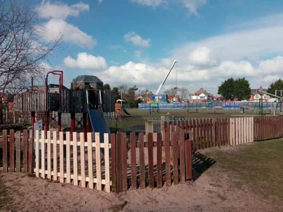The children's play area at Highfield Park where fencing has had to be repaired after it was smashed by vandals