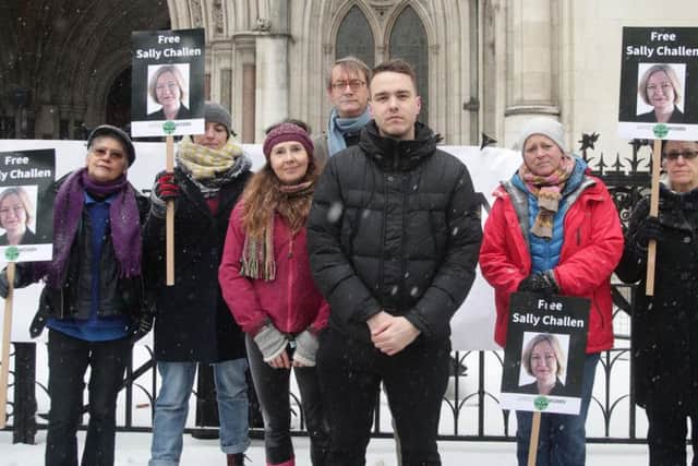 Georgina Challen's son, David Challen (centre) with members of Justice for Women protesting outside the Royal Courts of Justice, London. Photo credit: Yui Mok/PA Wire