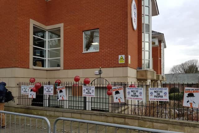 Placards placed on railings outside the EFL's headquarters