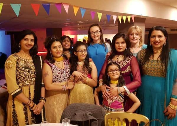 Sally Westgate (centre) with dancers from the Fylde Coast Hindu Society at her fund-raising evening