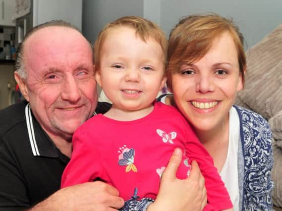 Jorgie Rae Griffiths with her parents Barry Griffiths and Lauren McCabe