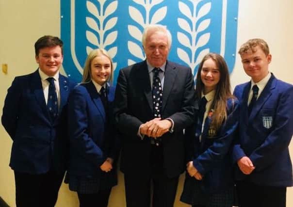 Veteran BBC broadcaster and Question Time host David Dimbleby took time out from rehearsals to post with pupils Kaidon Young, Lauren Tucker, Rosanna Bates and Henry Sandwell