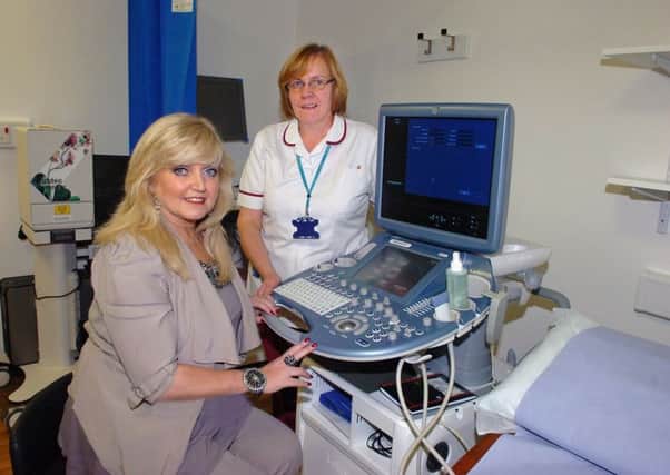 Linda Nolan opened  the new Breast Care Centre at Blackpool Victoria Hospital. Superintendent Radiographer Ruth Child with Linda in the ultrrasound room.