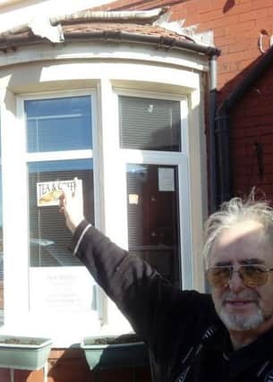 John Shaw, of Blackpool Music School, points to the damage left after a lead theft attempt