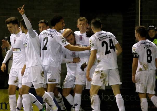 Danny Rowe and his AFC Fylde team-mates had plenty to celebrate