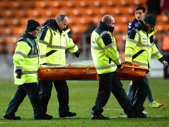 Delfouneso was stretchered off by paramedics