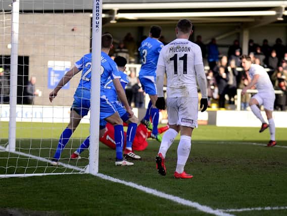 Andy Bond blasts home the first of his two goals against Hartlepool
Picture: STEVE MCLELLAN