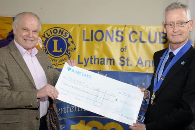 LSA Lions president Roger Franklin presents a cheque for Â£15,000 to Steve Dayman, national chairman and founder of Meningitis Now