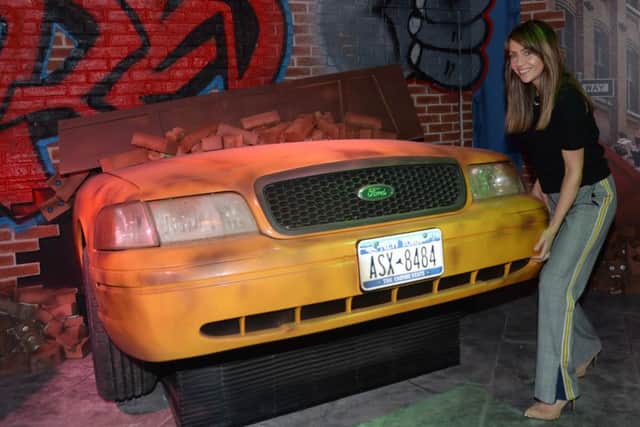 Samia Longchambon of TV's Coronation Street lifts a taxi in the Hulk area