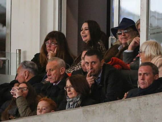 Owen Oyston (back right) labeled Natalie Christopher (back centre) a breath of fresh air at Blackpool FC