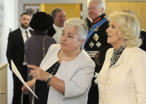 The Duchess of Cornwall visits the offices of The Silver Line where Esther Rantzen is president and founder.  She is pictured with chief executive Sophie Andrews.