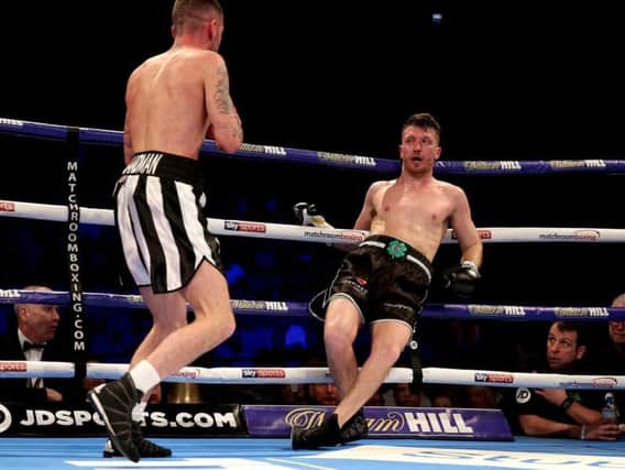 Scott Cardle is left reeling by a Lewis Ritson blow seconds before their fight was stopped