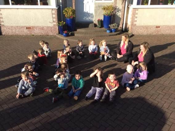 Youngsters and staff at Nutkins Nursery celebrate 10 years in business