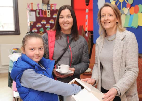 Lara Kember,10, with Jo Kember and Lesley Dobson at the Lytham St Annes Friends of Trinity Hospice coffee morning