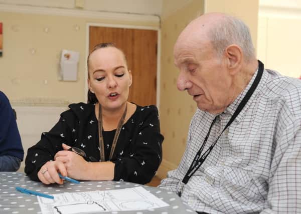 Residents at Ashbourne Lodge Rest Home are being given lessons by tutors from Blackpool and the Fylde College.  Tutor Nina Garwood with Richard Sanderson.