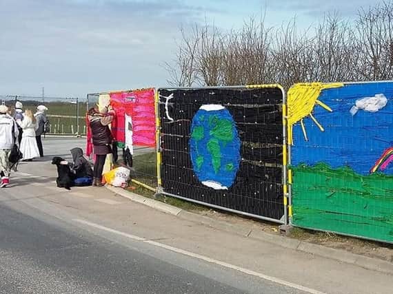 The  decoration on the security fences at the Preston New Road fracking site