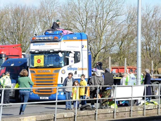 Fracking protesters climb on to a truck on the M6 southbound services at Forton earlier this week.