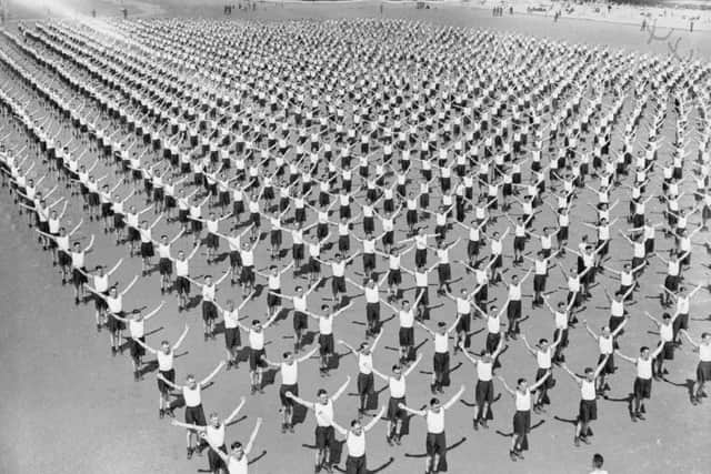 Two thousand RAF recruits gave a demonstration of physical training on the beach at their training station at Blackpool, during the 
Second World War. Pic courtesy of the Imperial War Museum