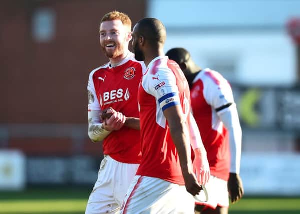 Fleetwood Town's Cian Bolger and Nathan Pond celebrate